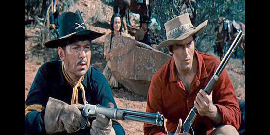 Claude Akin as the sergeant and Clint Walker as Yellowstone Kelly await the next Sioux attack in Yellowstone Kelly (1959)