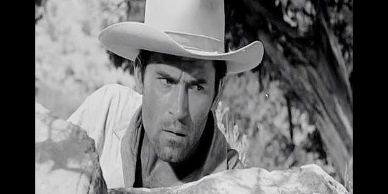 Clint Walker as Gar Davis, trying to find a way out of a Comanche ambush in Fort Dobbs (1958)