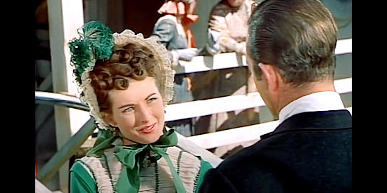 Coleen Gray as Goldie Slater, arriving in town to marry Cowpoke in Tennessee's Partner (1955)
