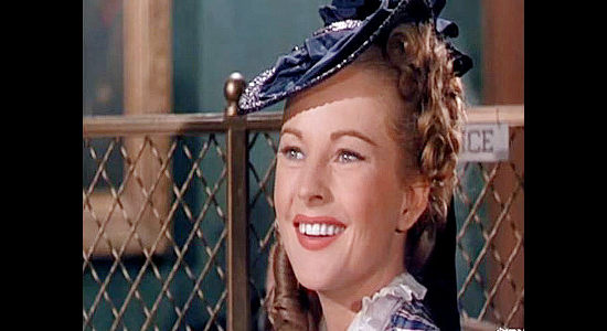 Coleen Gray as Jane Colfax, spotting childhood sweetheart Rockwell Grayson on his return to Galeston in The Vanquished (1953)