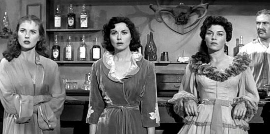 Coleen Gray as Jeannie, Adele Mara as Ruthie and Dorothy Schyuler as Delilah, in the sheriff's linep to determine who freed Chick Hainline in The Black Whip (1956)