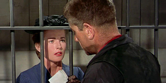 Coleen Gray as Nellis Matson, getting directions from Sam Hall on how to help him break jail in Star in the Dust (1956)