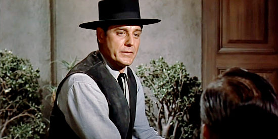 Craig Stevens as Abe Carbo, Judge Simon's hired protector in Buchanan Rides Alone (1958)