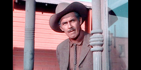 Craig Woods as Dave Parker, the man who wants all Tallons dead because of a Civil War disaster in Fort Defiance (1951)