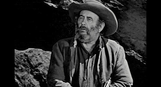 Chubby Johnson as grandpa, a former outlaw guarding the Black Crater hideout in The Young Guns (1956)