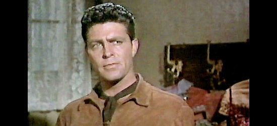 Dale Robertson as Jagade, trying to convince Sharman the right side of town is the wrong side for her in A Day of Fury (1956)
