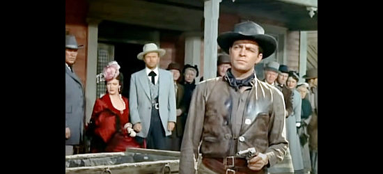 Dale Robertson as John Banner, facing down one of his former gang members in Dakota Incident (1956)