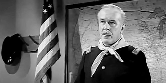 Damian O'Flynn as Maj. Reid, the post commander in Apache Warrior (1957)