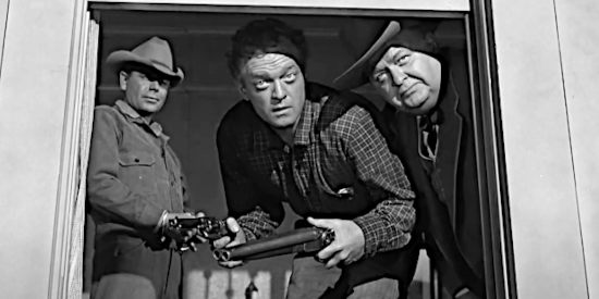 Dan Evans (Van Heflin) and Butterfield (Robert Emhardt) making sure the coast is clear while Ben Wade (Glenn Ford) looks on in 310 to Yuma (1957)