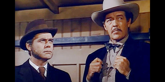 Dan Riss as George Armstrong and Frank Fenton as U.S. Marshal Gilson, trying to bring bandits to justice in Wyoming Mail (1950)