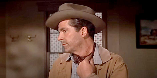 Dana Andrews as Jim Guthrie, showing off the scar he still bears from nearly being lynched in Three Hours to Kill (1954)
