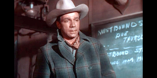 Dane Clark as Johnny Tallon, realizing his younger brother is serious about parting ways in Fort Defiance (1951)