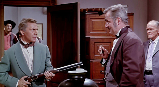 David Wayne as Tracy Powell, threatening Haver (Jim Backus) when he thinks he's been cheated again in The Naked Hills (1956)