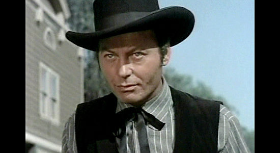 DeForest Kelly as Jim Breck, the hired gun summoned to frighten the sheriff in Tension at Table Rock (1956)