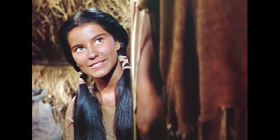 Debra Paget as Sonseeahray, stealing a peek at Tom Jeffords upon his return to the Apache camp in Broken Arrow (1950)