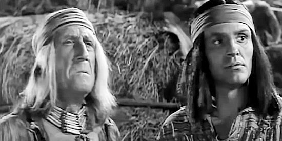 Dehl Berti as Chikisin, Katawan's brother, with Nantan (John Miljan) in Apache Warrior (1957)