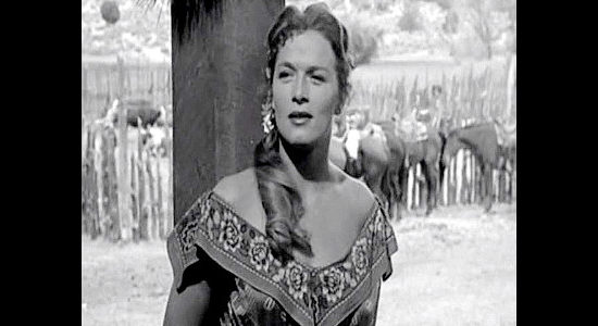 Denise Darcel as Fifi Danon, all dressed up and ready to pick a partner after the difficult journey West in Westward the Women (1951)