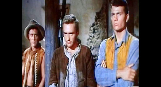 Dennis Hopper as Hatfield Carnes, awaiting his sentencing along with Lee Hearn (Ken Curtis) and Sheriff Ellison (Patrick Wayne) in The Young Land (1959)