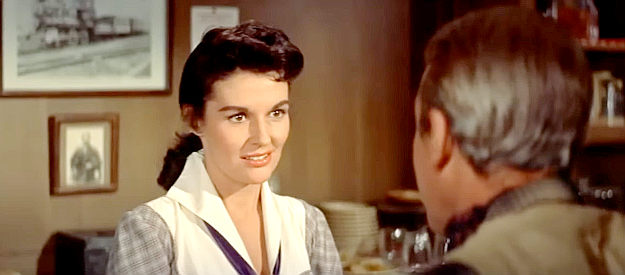 Dianne Foster as Charlotte 'Charlie' Drew, the woman who's been waiting five years for The Utica Kid to go straight in Night Passage (1957)