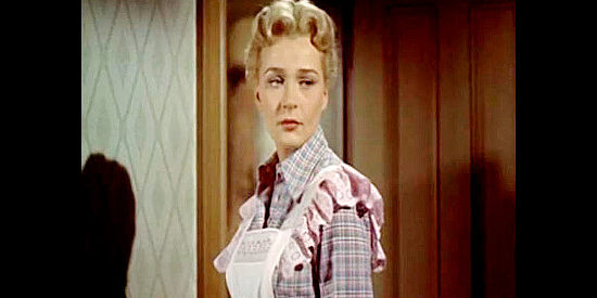 Dolores Dorn as Julie Spencer, worried about her father when he starts drinking again in The Bounty Hunter (1954)