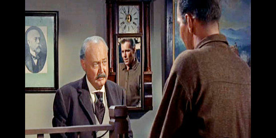 Don Beddoe as banker Horace Warren, Nancy's protective father with Brady Sutton (Philip Carey) in Wyoming Renegades (1955)