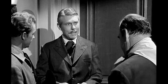 Don C. Harvey as Maj. Donald 'Tex' McGuire, the former southern officer who agrees to help with a special cattle drive in Apache Ambush (1955)