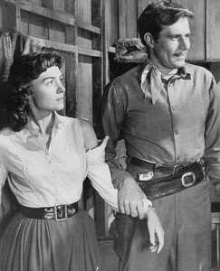 Donna Reed as Jennifer Ballard and Philip Carey as Frank Slayton in Gun ...