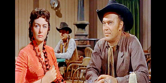 Donna Reed as Karyl Orton with Jeff Welker (Robert Wilke), a man looking to even a score with Jim Slater in Backlash (1956)