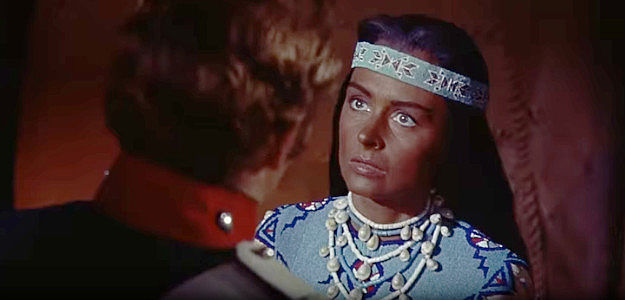 Donna Reed as Sacajawea, trying to understand why it would be wrong for her to spend the night in Lt. William Clark's tent in Far Horizons (1955)