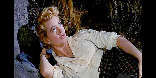 Dorothy Malone as Calla Gaxton, the woman infatuated with Emmett Bell though she's married to another man in Pillars of the Sky (1956)