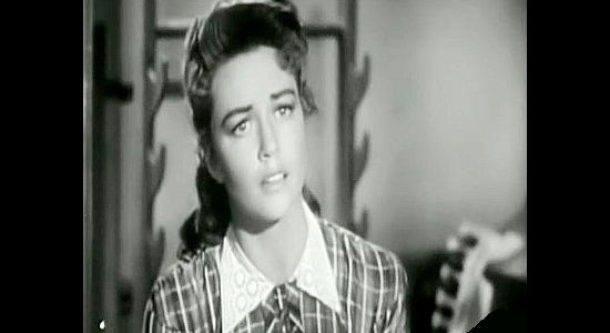 Dorothy Malone as Cathy Sharpe, a journalist's daughter urging someone to stand up to Artemus Taylor in The Bushwhackers (1952)