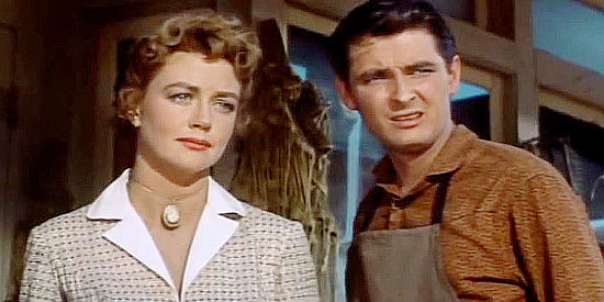 Dorothy Malone as Martha Wright and James O'Hara as her brother Wally, realizing an old friend has died in At Gunpoint (1955)