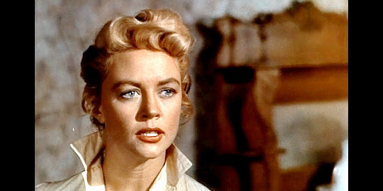 Dorothy Malone as Shalee, suddenly faced with five men who have gold and her on their minds in Five Guns West (1955)