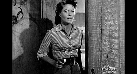 Dorothy Malone as Virgina Maria Dale, unexpectedly finidng herself in the middle of a shoot-out in Jack Slade (1953)
