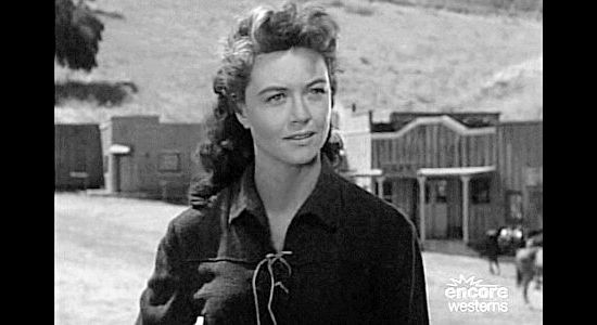 Dorothy Malone as Virginia Maria Dale, intrigued by Jack Slade and the excitement he could bring to her life in Jack Slade (1953)