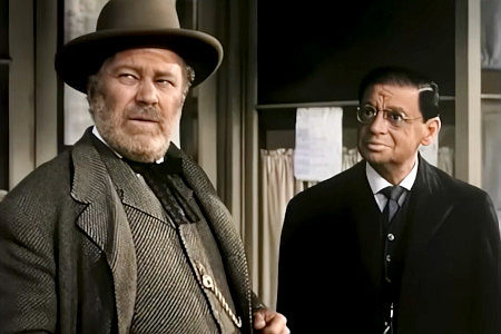 Edgar Buchanan as Walter 'Yukon' Burns and Michael McHale as a government man named Keller in The Big Trees (1952)
