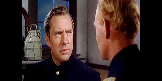 Edmund O'Brien as John Vickers, being questioned about his reasons for joining the cavalry in Warpath (1951)