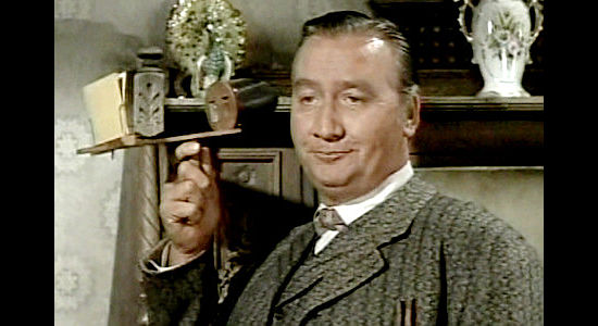 Edward Andrews as Kirk, a saloon owner looking forward to the money he'll make off a trail crew in Tension at Table Rock (1956)