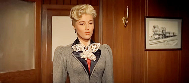 Elaine Stewart as Verna Kimball, once Grant McLaine's girl, now married to a railroad executive in Night Passage (1957)