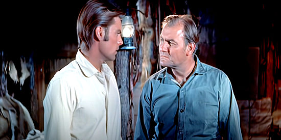 Emile Meyer as Magruder, the Indian hating trading post owner, with Josh Tanner (Robert Wagner) in White Feather (1955)