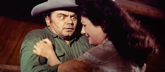 Ernest Borgnine as Shep Horgan, mad with jealousy over wife Mae (Valerie French) in Jubal (1956)