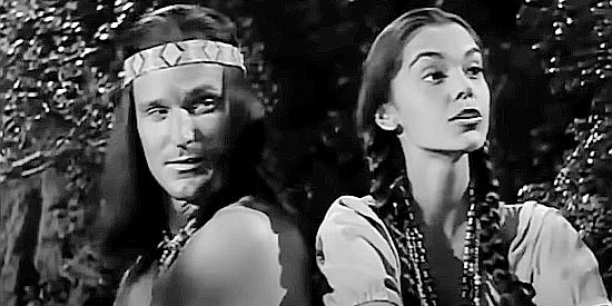 Eugenia Paul (right) as Liwana, musing about life as Katawan's wife in a white man's world in Apache Warrior (1957)