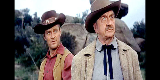 Fay Roope as John Lawrence, leader of the plan to steal Union gold for the Confederate cause with Frank (Richard Webb), one of his henchmen, in The Black Dakotas (1954)