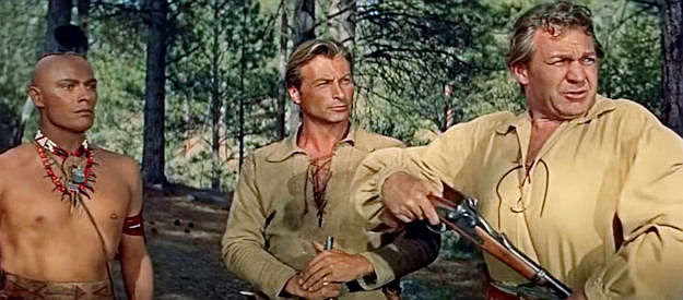 Forrest Tucker as Harry March explaining the urgency of getting the Hutter girls to safety to Deerslayer (Lex Barker) and Chingachgook (Carlos Rivas) in The Deerslayer (1957)
