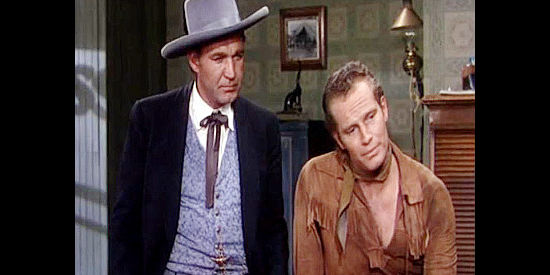Forrest Tucker as Wild Bill Hickok and Charlton Heston as Buffalo Bill, laying out plans for the Pony Express in Pony Express (1953)