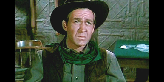 Forrest Tucker as bank robber Tom Tanner, denying that he knows Andrew Barclay in The Nevadan (1950)