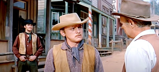 Frank Gorshin as Billy Gannon, ignoring his older brother's pleas to leave town and avoid a showdown with Blaisdell in Warlock (1959)