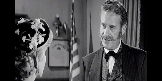 Frank Wilcox as Gov. Crittenden, explaining how he'll offer amnesty in return for Jesse James in Hell's Crossroads (1957)