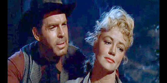 Fred MacMurray as Gentry and Dorothy Malone as Chaney, dreaming of a possible future in Quantez (1957)