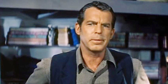 Fred MacMurray as Jack Wright, a store keeper whose lucky shot lands him in a world of trouble in At Gunpoint (1955)